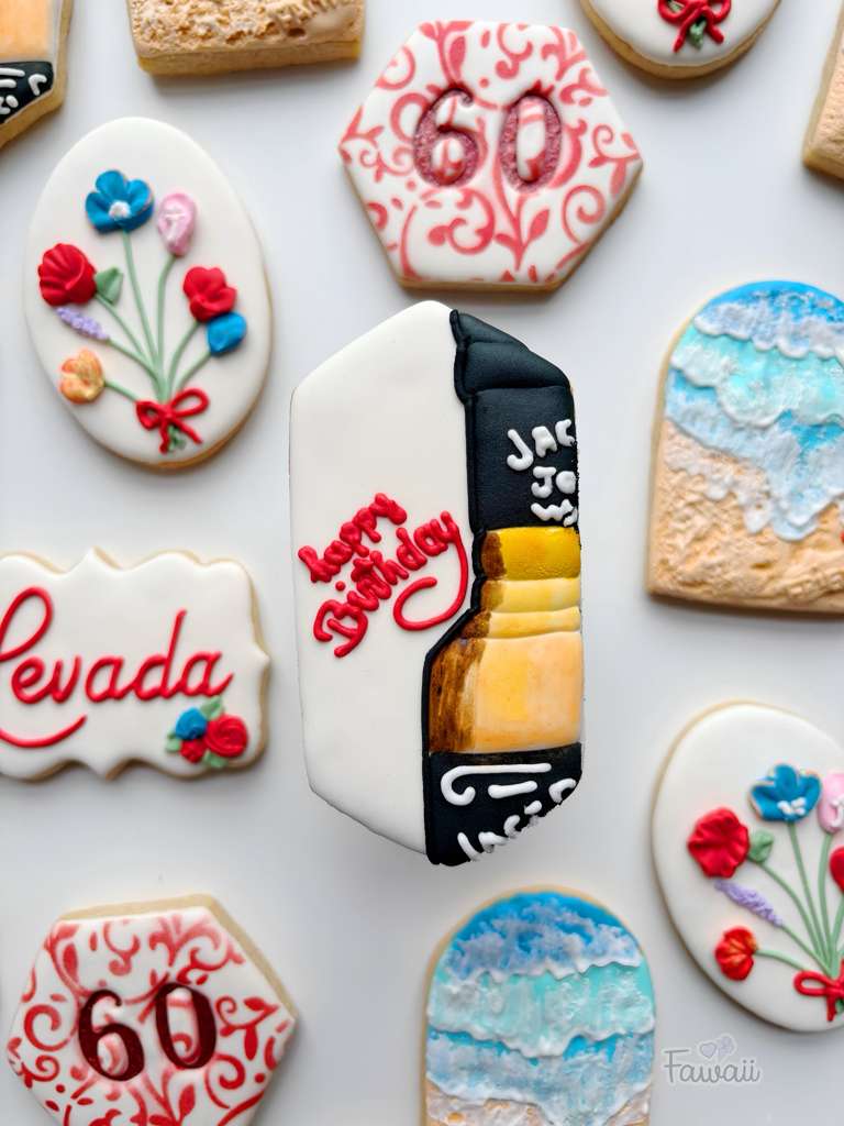 Celebration themed decorated sugar cookies by Fawaii Custom Cookies